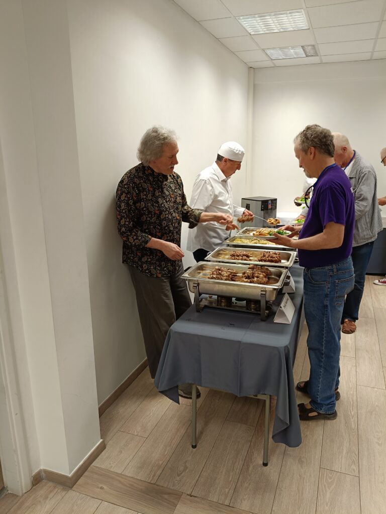 Dr. Ori Soltes (Head of the Arts & Culture Unit, Athens Institute & Professor at Georgetown University, USA), is serving dinner to the participants along with Gregory T. Papanikos, President of the Athens Institute.