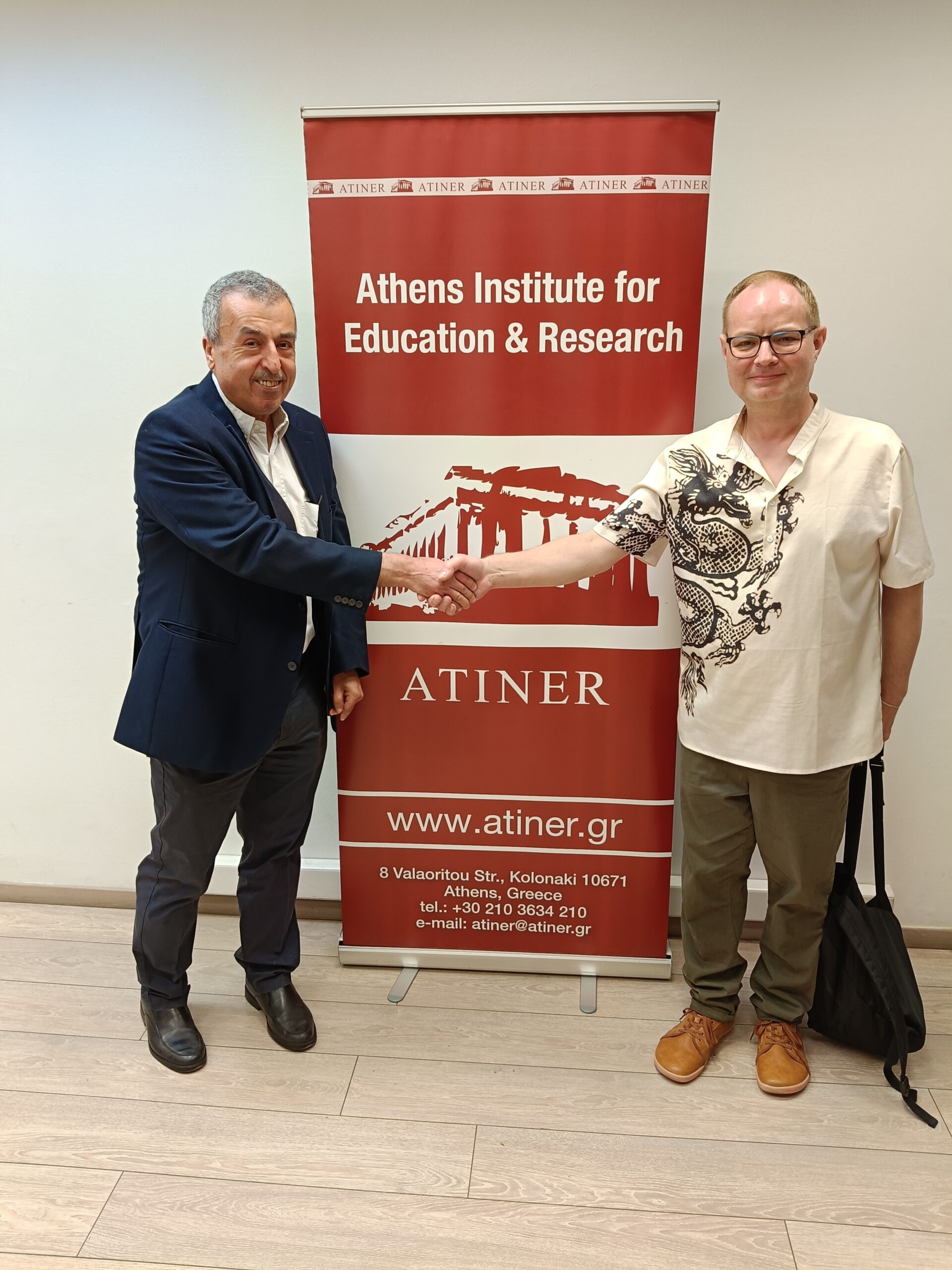 Dr. Papanikos on the left with Dr. Ken Moore on the right https://www.atiner.gr/wp-content/uploads/2025/06/IMG20250603220540_01-scaled.jpg